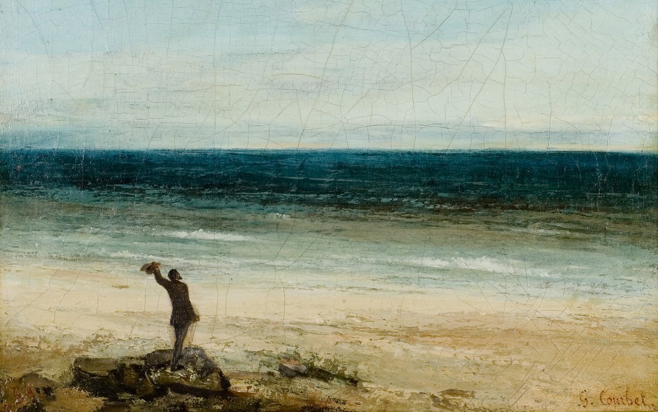 Gustave Courbet’s The Seaside at Palavas: a lone man on the rocks at the edge of a wide beach, his back to us, raising his hat to the sea.